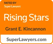 Orange and white badge displaying "Rising Stars" awarded to Grant E. Kincannon.
